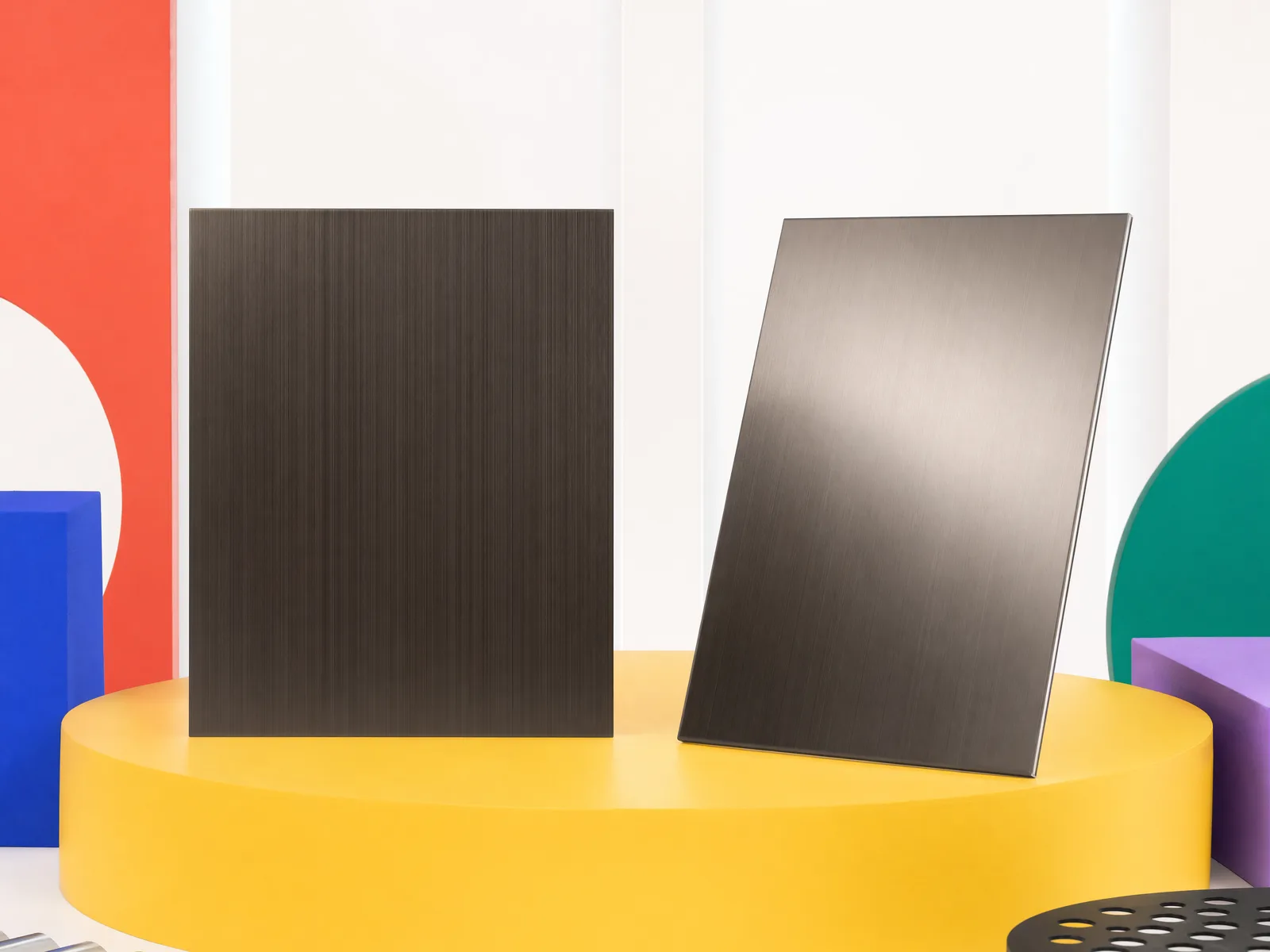 Same graphite-bronze brushed stainless reference viewed straight-on and at 45 degrees