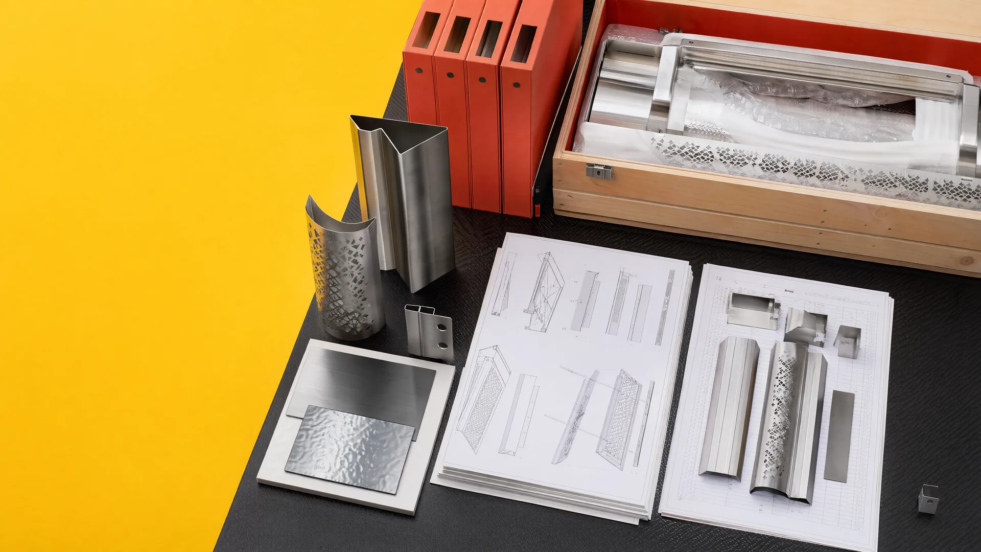 Representative project-review table with drawings, samples, coordinated parts and export crate